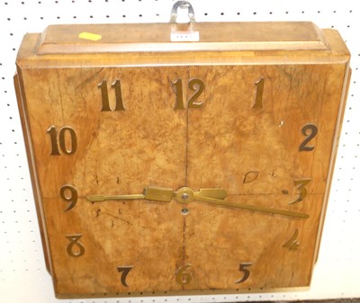 Lot 1142 - An Art Deco figured walnut square wall clock,...