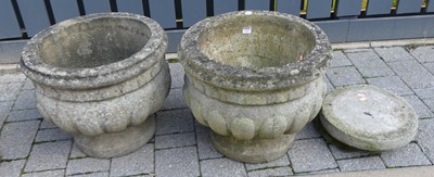 Lot 1150 - A pair of stone circular squat pedestal...