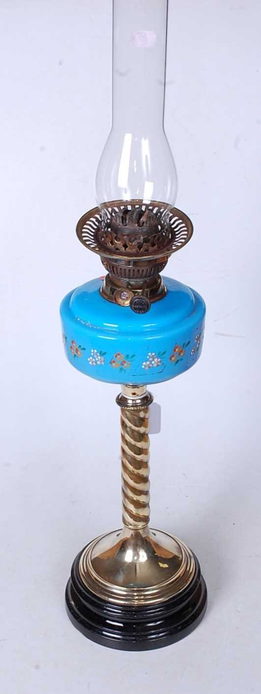 Lot 149 - A Victorian oil lamp having a blue glass and...