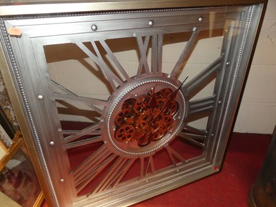 Lot 1100 - A large decorative quartz wall clock, having...