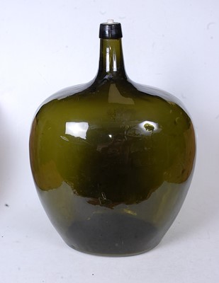 Lot 173 - An early 20th century green glass carboy, h.49cm
