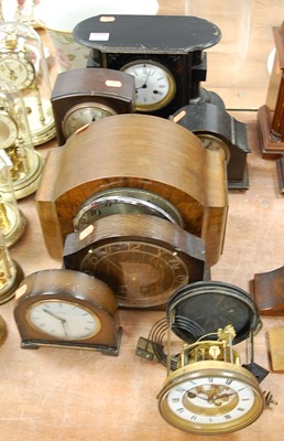 Lot 162 - A 1930s walnut cased mantel clock having a...