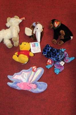 Lot 187 - Two boxes of soft toys and dolls, to include a...