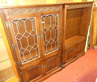 Lot 1175 - A contemporary Old Charm linenfold moulded oak...