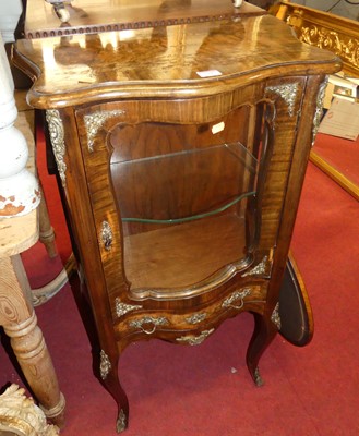 Lot 1185 - An early 20th century French figured walnut...