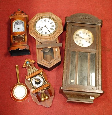 Lot 204 - A 1930s oak cased wall clock; together with a...