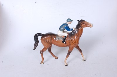 Lot 212 - A Beswick racehorse and jockey (walking...