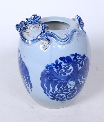 Lot 213 - A Chinese vase, of ovoid form, on a blue...