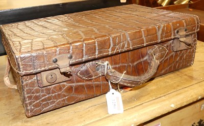 Lot 1250 - An early 20th century crocodile skin...