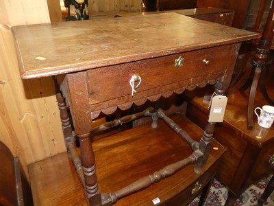 Lot 1260 - A provincial antique joined oak single drawer...