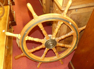 Lot 1273 - A stained elm and brass bound ships wheel, dia....