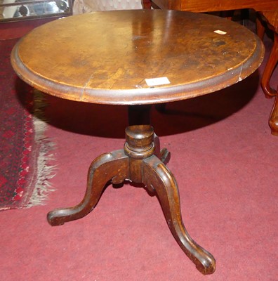 Lot 1275 - A Victorian figured walnut circular low...