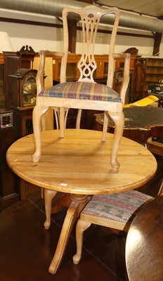 Lot 1279 - A modern pine circular pedestal kitchen table,...