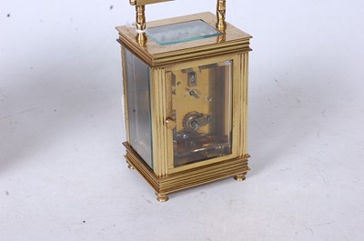 Lot 233 - An early 20th century French lacquered brass...