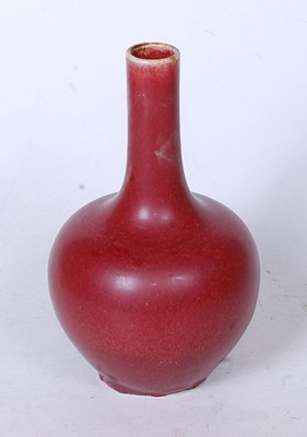 Lot 238 - A Chinese sang-de-boeuf bottle vase, the...