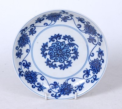 Lot 242 - A Chinese export blue and white glazed dish,...