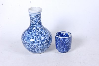 Lot 264 - A Chinese export blue and white glazed tea...