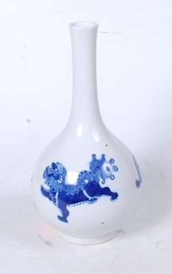 Lot 268 - A Chinese export blue and white glazed bottle...