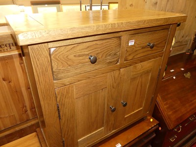 Lot 1221 - A contemporary light oak double door side...