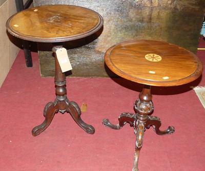 Lot 1231 - Two mid-Victorian walnut circular fixed top...