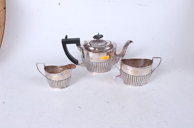 Lot 284 - An Edwardian silver bachelors three-piece tea...