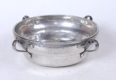 Lot 288 - An Arts & Crafts style hammered pewter bowl,...