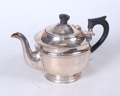 Lot 290 - A mid-20th century silver teapot, of plain...