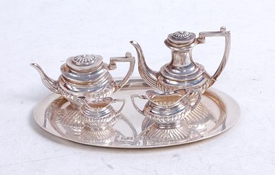 Lot 325 - A modern silver miniature four piece tea...