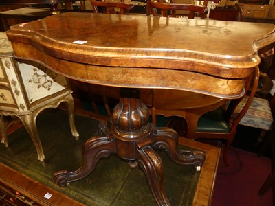 Lot 1308 - A mid-Victorian figured walnut serpentine...