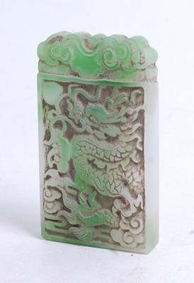 Lot 335 - A faux jade pendant, carved as a dragon...