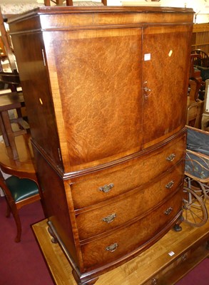 Lot 1312 - A figured walnut bowfront compactum side...