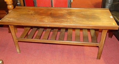 Lot 1316 - A 1970s teak long rectangular coffee table,...