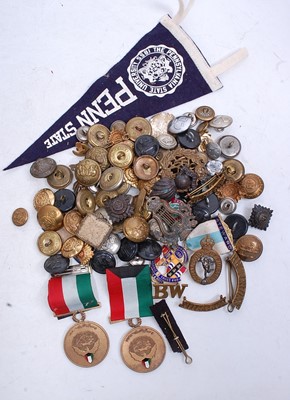 Lot 376 - A collection of assorted military badges,...
