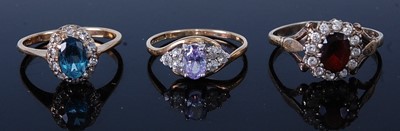 Lot 386 - A 9ct gold, amethyst and cz set dress ring,...