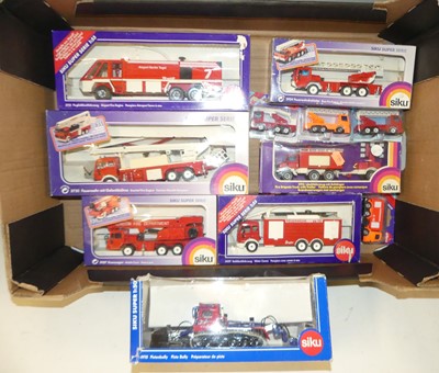 Lot 1537 - One box of eleven Siku boxed model fire engines