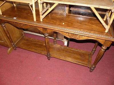 Lot 1408 - A contemporary French style oak long two-tier...