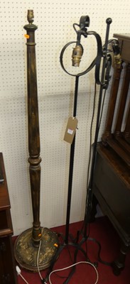 Lot 1413 - Two similar black painted wrought iron...