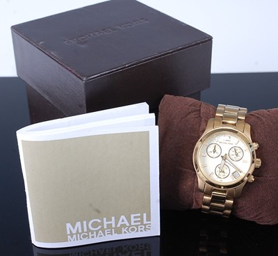 Lot 402 - A Michael Kors gents gold plated chronograph...