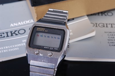 Lot 404 - An early gents Seiko LC Digital quartz steel...