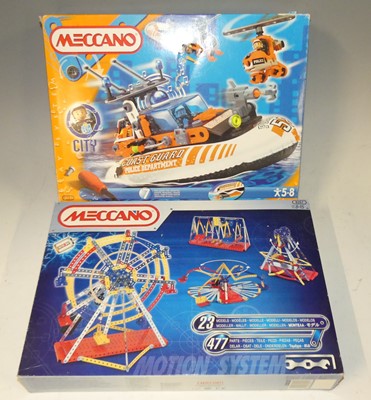 Lot 1554 - A box containing two Meccano boxed sets, two...