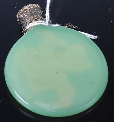 Lot 430 - A green jade ovoid scent bottle having lightly...