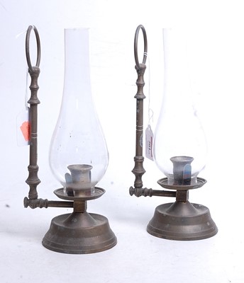 Lot 501 - A pair of brass wall hanging candle lanterns