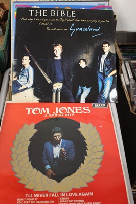 Lot 637 - A box of assorted 7" singles, some loose and...