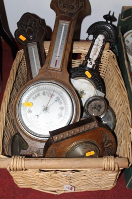 Lot 655 - An oak two dial wheel barometer, mid-20th...