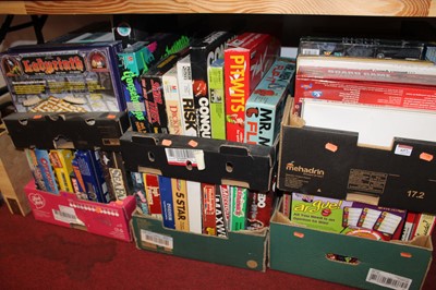 Lot 657 - Six boxes containing various boardgames, to...