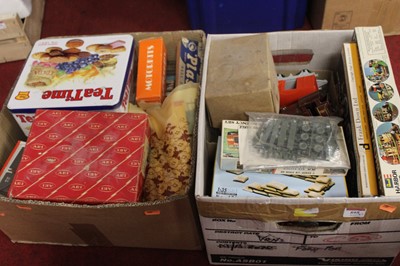 Lot 595 - Two boxes of assorted childrens toys, games...