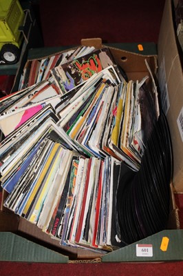 Lot 601 - A collection of assorted 7" singles, dating...