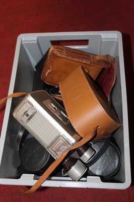 Lot 606 - A collection of cameras and accessories, to...