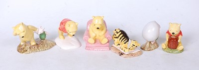 Lot 222 - A collection of six Royal Doulton Winnie the...