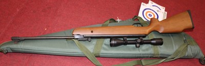 Lot 495 - An air rifle with scope, carry bag and target